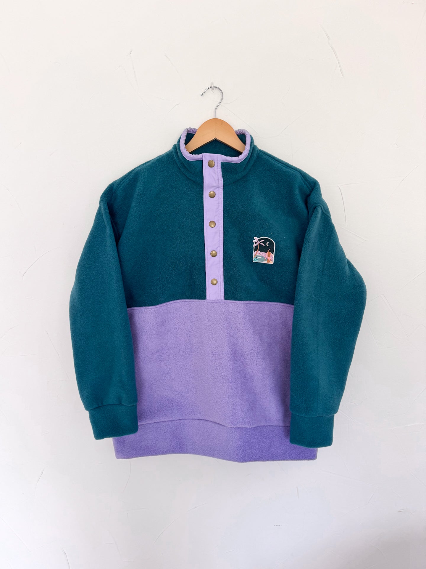 Veste polaire vert forêt et lila