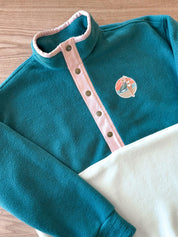 Veste polaire vert forêt, écru et rose pâle