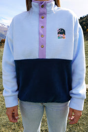 Veste polaire bleu ciel, vert essence et lila